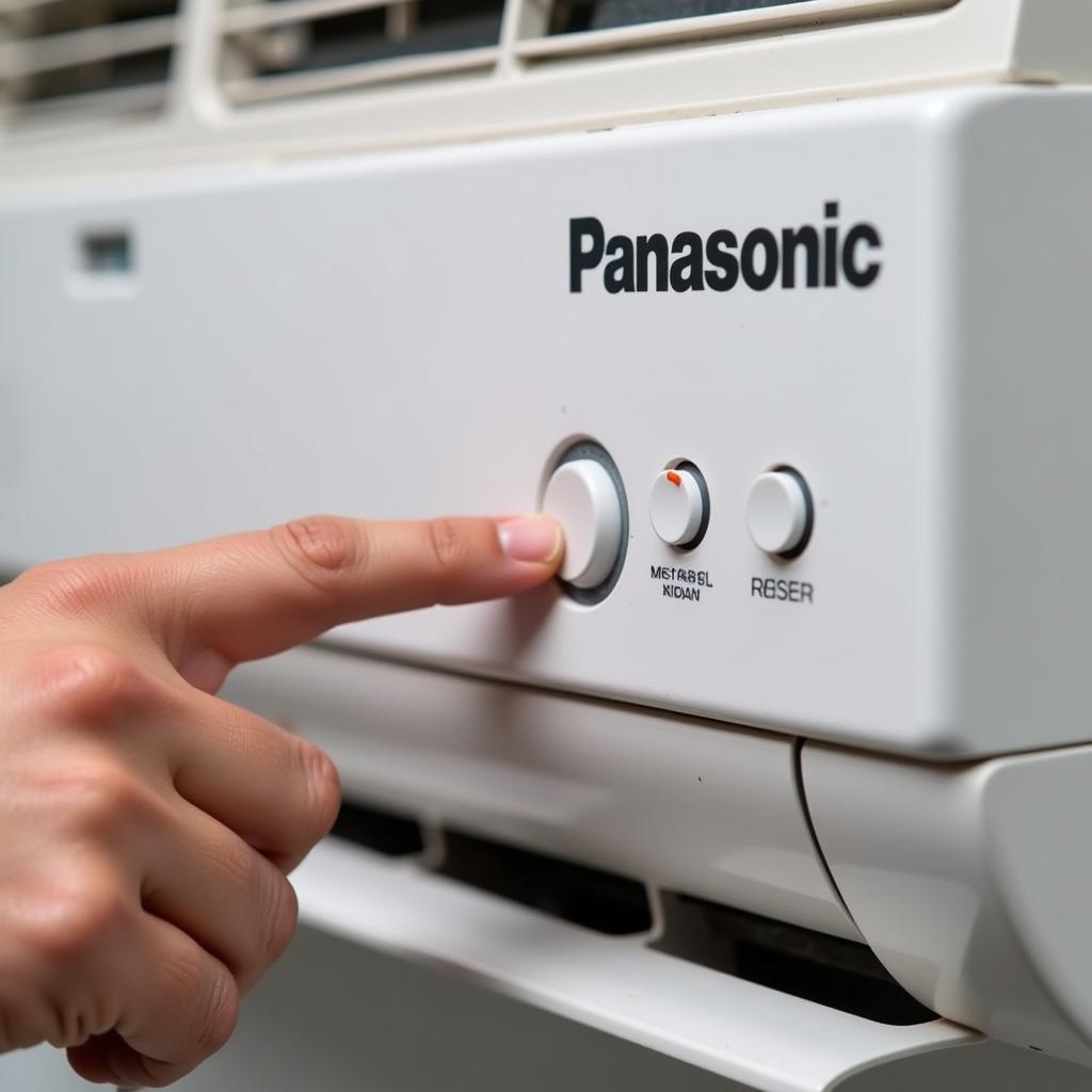 Nhấn nút nguồn để reset máy lạnh Panasonic